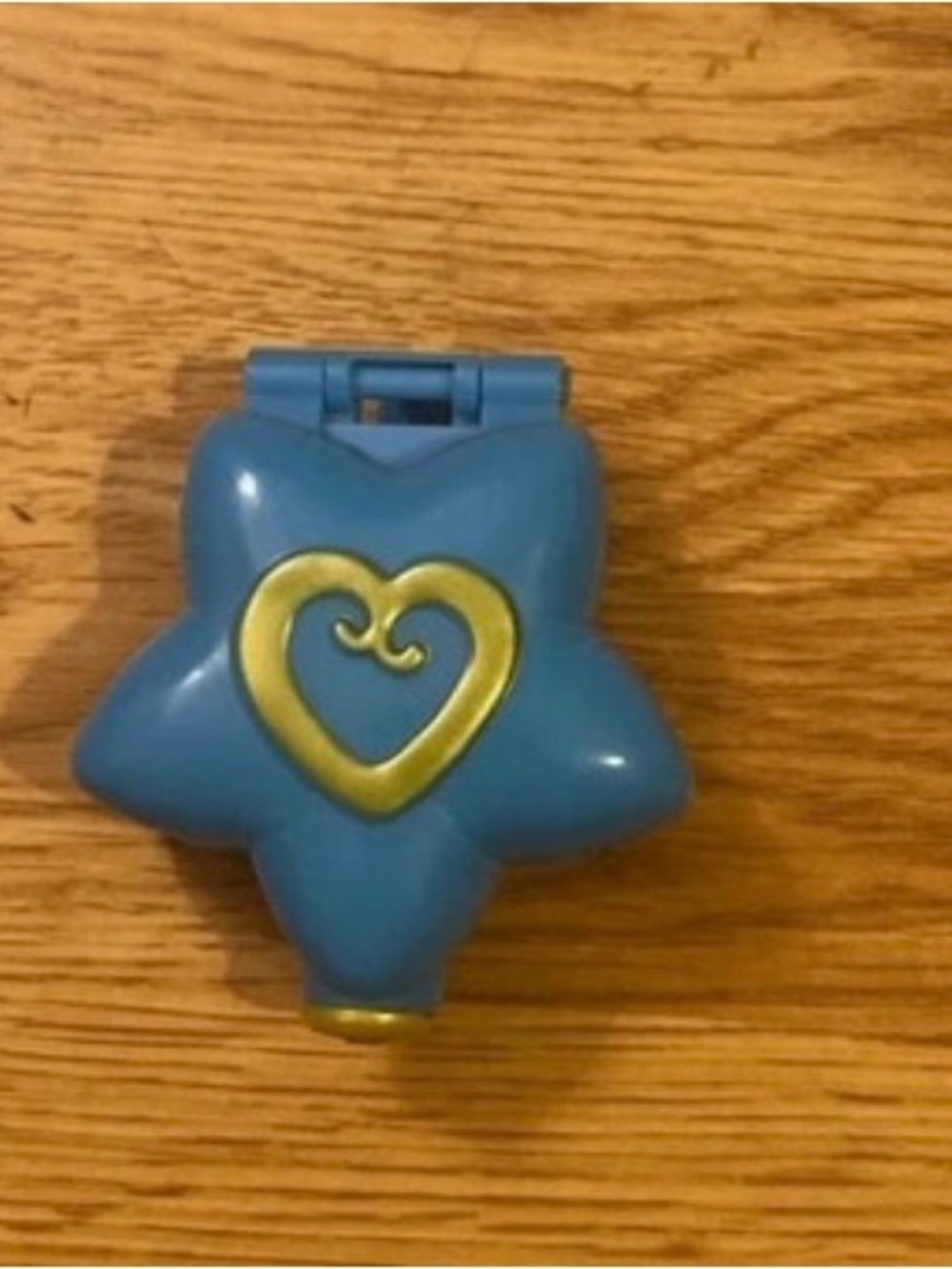 Polly Pocket Blue Star-Shaped Kids Accessory Case with Gold Heart Accent.